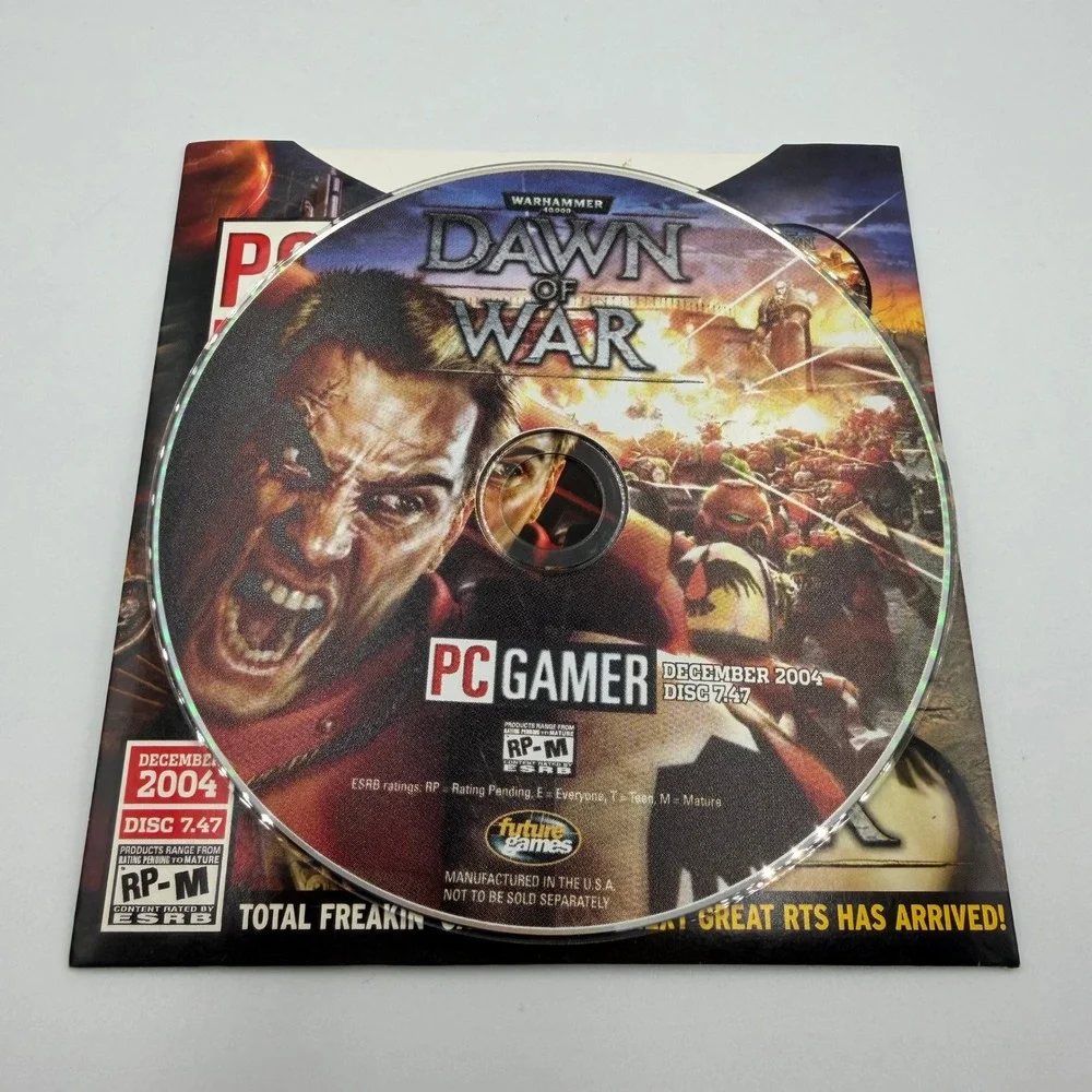 PC Gamer CD December 2004 Disc 7.47 Warhammer 40000 Dawn of War Demo Insert